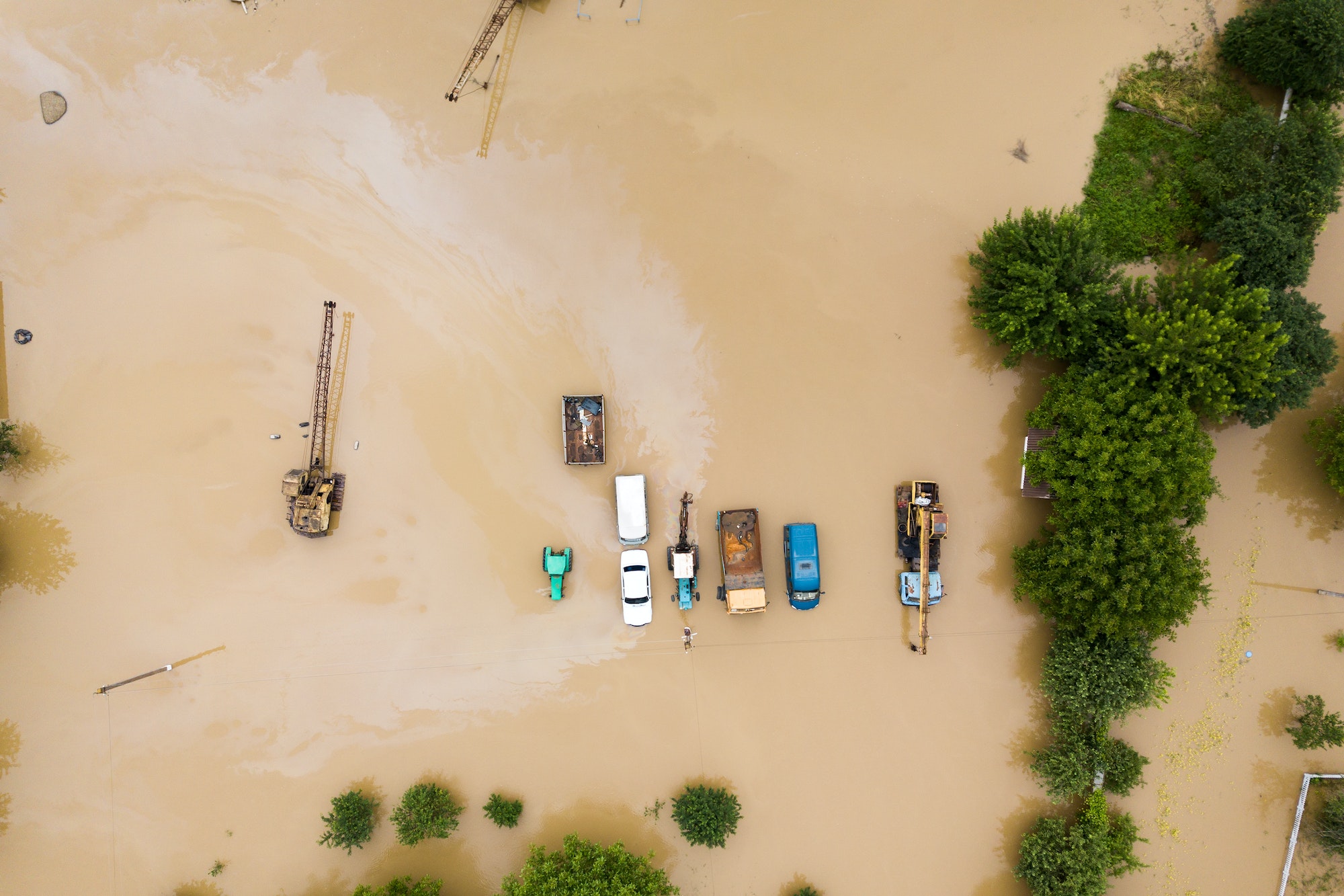 Aerial view of cars flooded with rain water