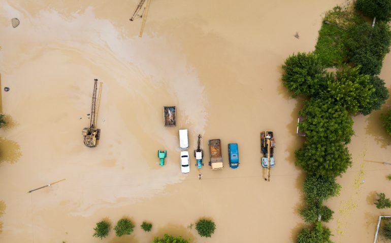 Aerial view of cars flooded with rain water